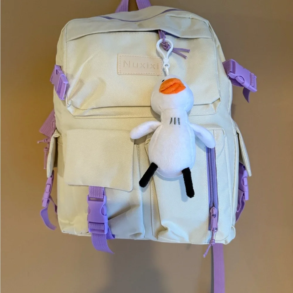 Cream Backpack with Purple Accents and Plush Keychain